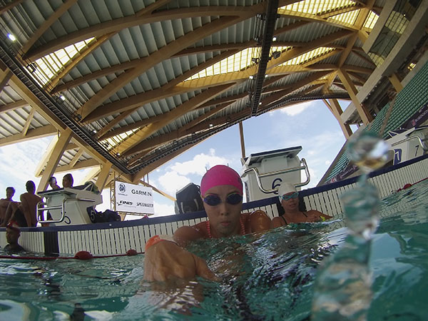 swimming in the New Clark City Aquatic Center competition pool