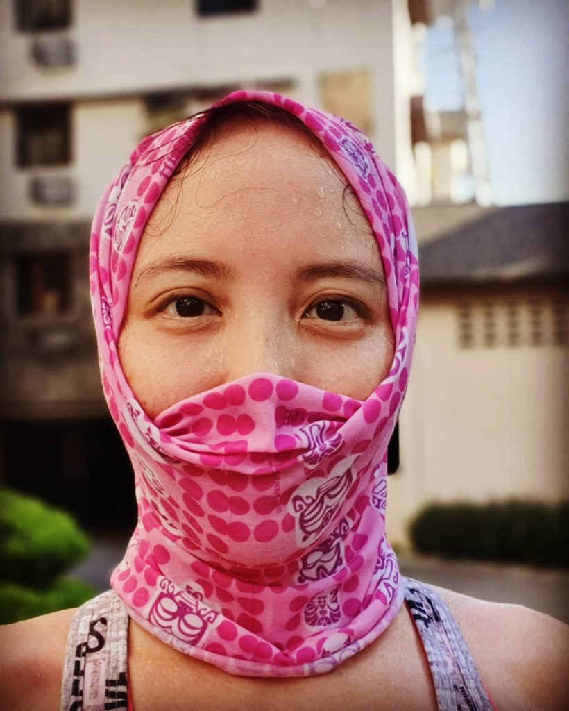 Wearing a head and face cover during a run